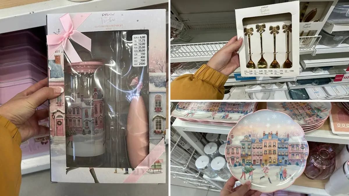 Sklenice s napěňovačem mléka, zlaté lžičky s mašlí a talíř se zimním městečkem. Sklenice s napěňovačem mléka, zlaté lžičky s mašlí a talíř se zimním městečkem.